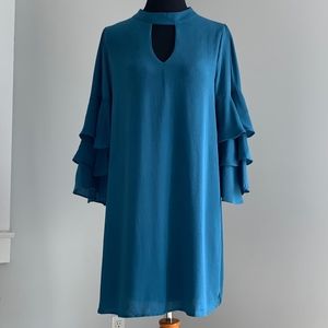 Periwinkle ruffled sleeve, thigh-high dress